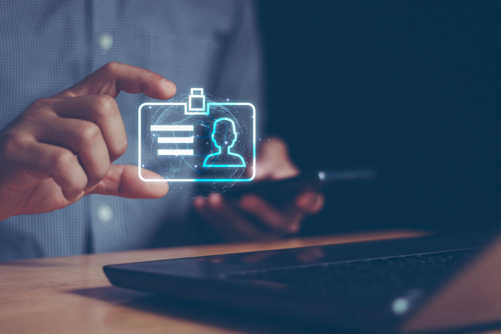 Businessman hand holding digital ID profile information card for modern business authentication digital identity privacy concept. Cyber security, secure internet access, data protection in the world.